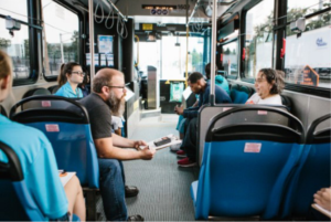 passengers riding a bus