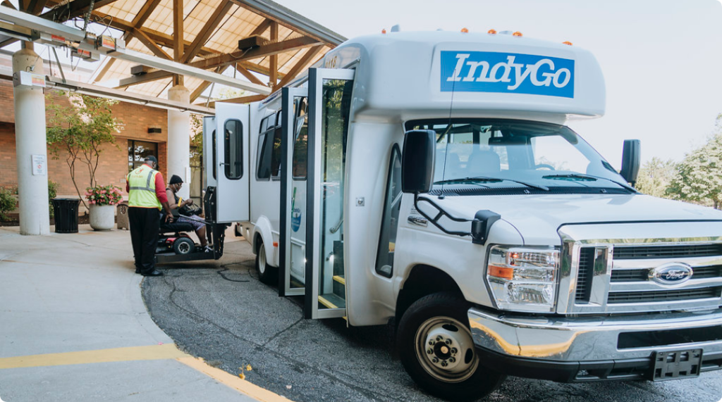 An IndyGo Open Door vehicle waits to pick up a passenger.