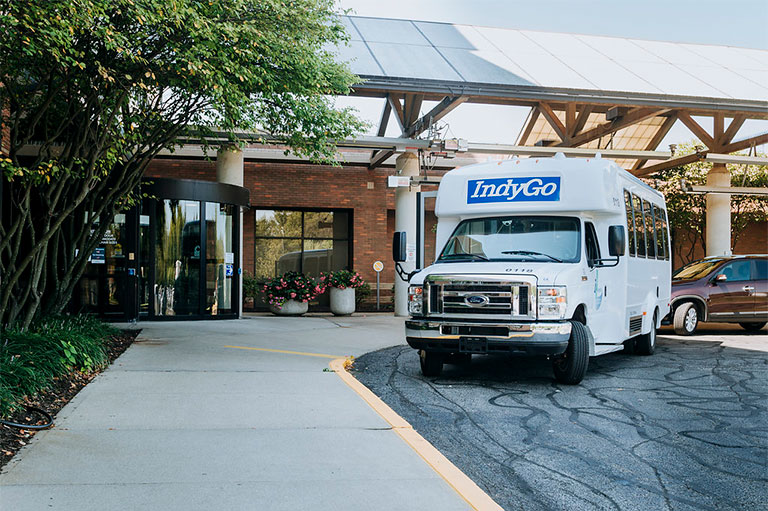 Paratransit bus at stop
